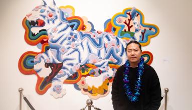 james jean in front of his art